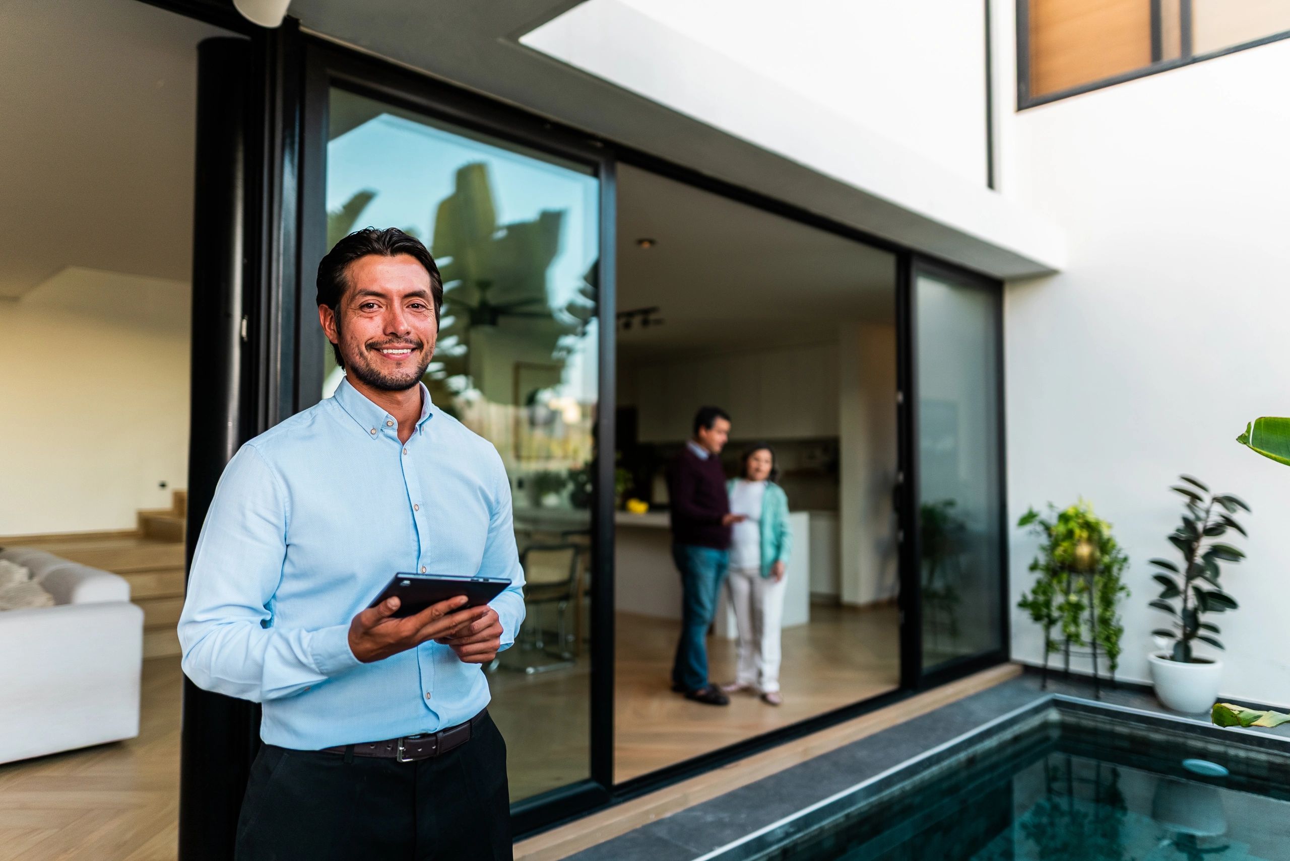 real estate agent showing home
