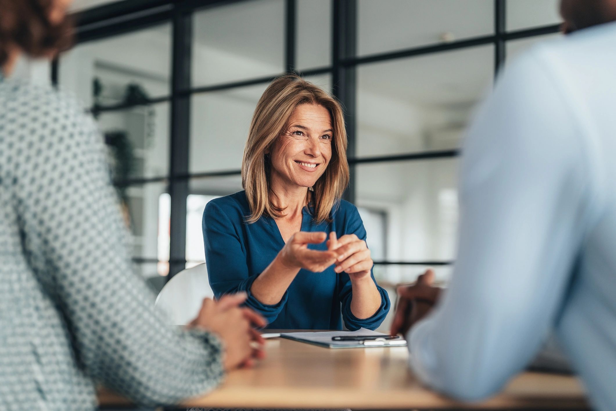 real estate agent working with clients