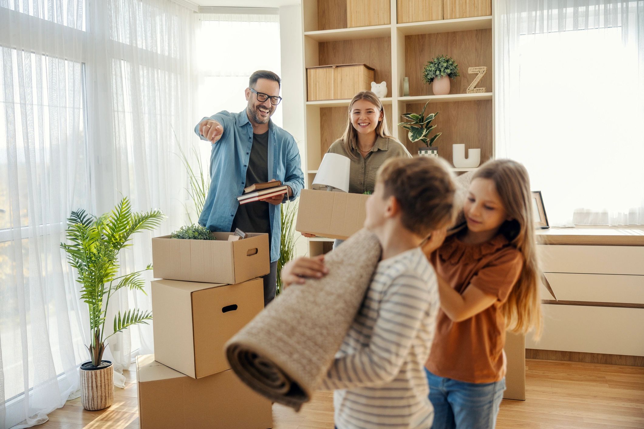 happy family moving in new home